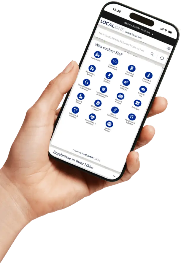 Una mano sostiene un smartphone con una barra de búsqueda e iconos de diferentes sectores en la pantalla para encontrar y seleccionar empresas rápidamente.